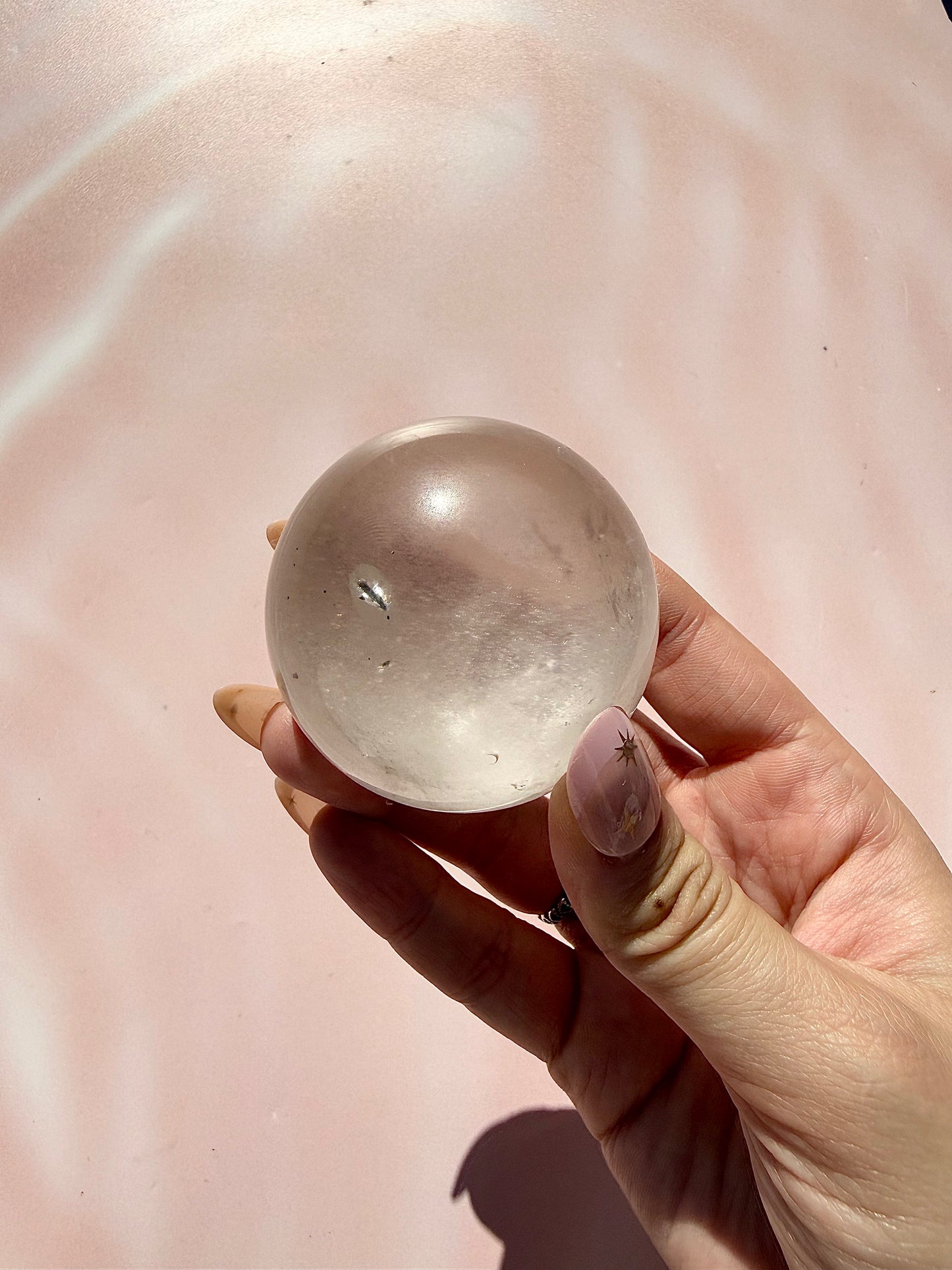 Clear Quartz Sphere with Black Tourmaline Inclusion