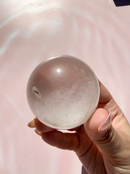 Clear Quartz Sphere with Black Tourmaline Inclusion